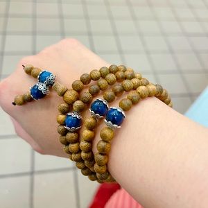 Real Agarwood Bracelet 108 beads with Blue Stone.